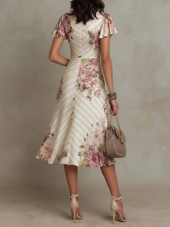 Janine | Elegante midi-jurk met retrobloemenprint