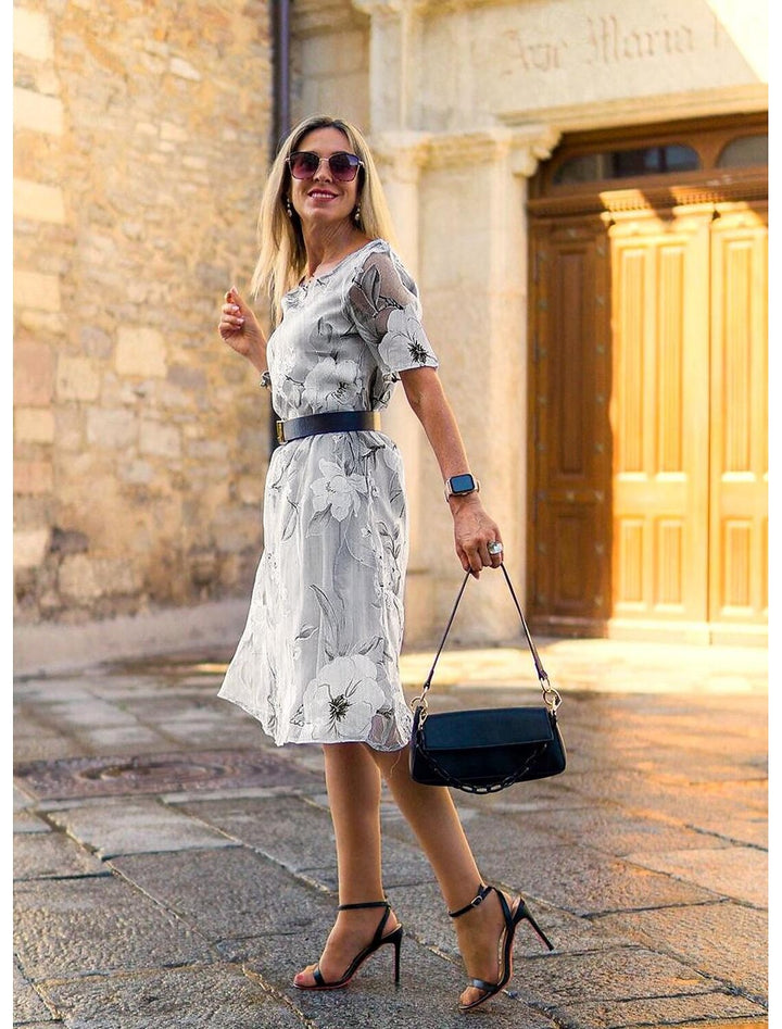 Serenella - geplooide midi-jurk met bloemenprint