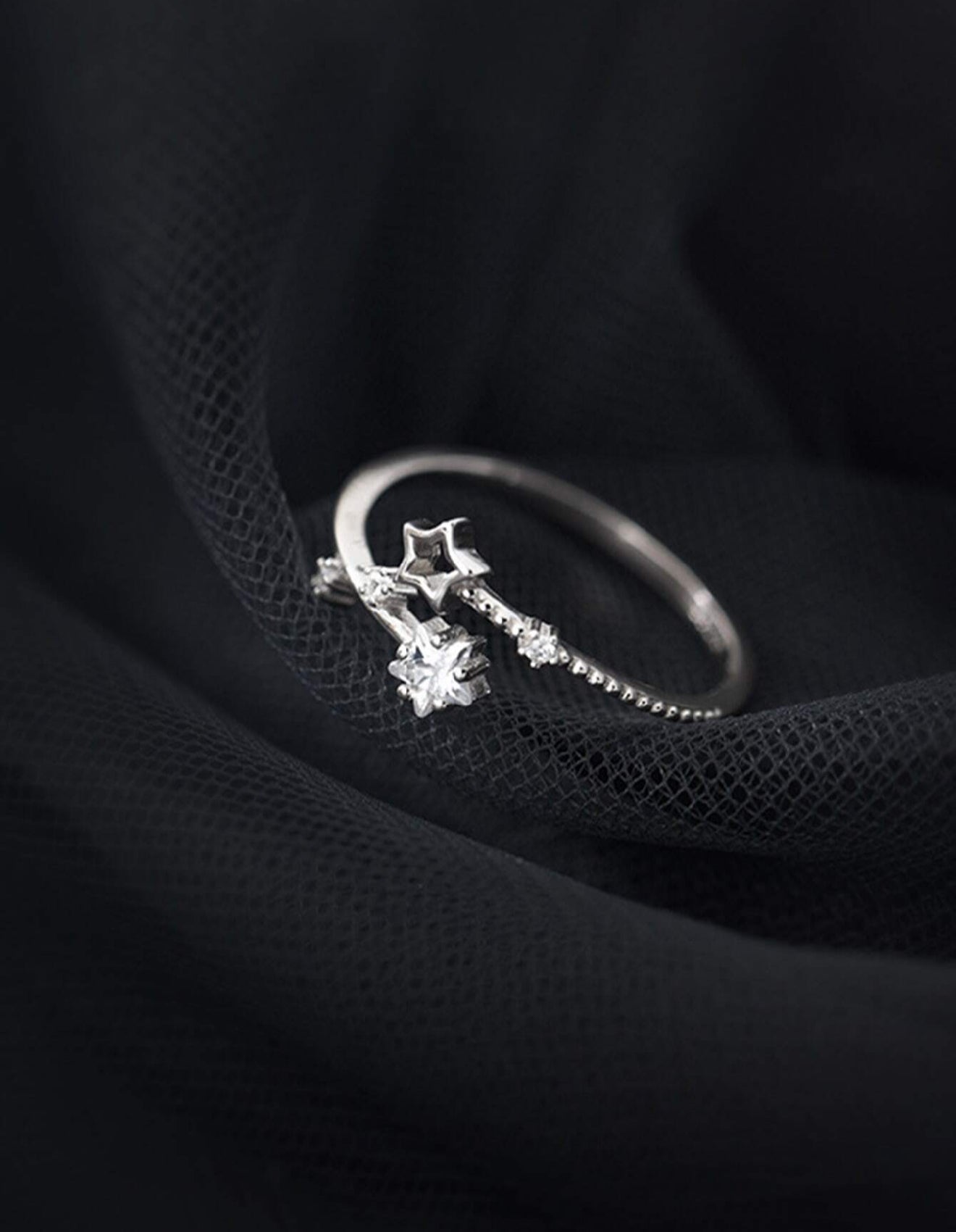 Sortija de dama de plata 925 con detalle de estrella ajustable