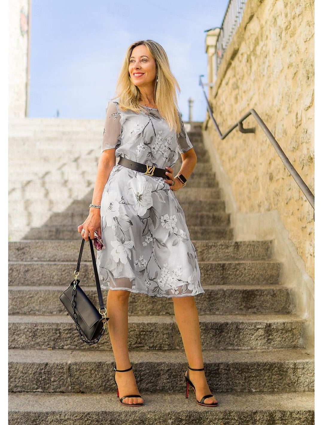 Serenella - geplooide midi-jurk met bloemenprint