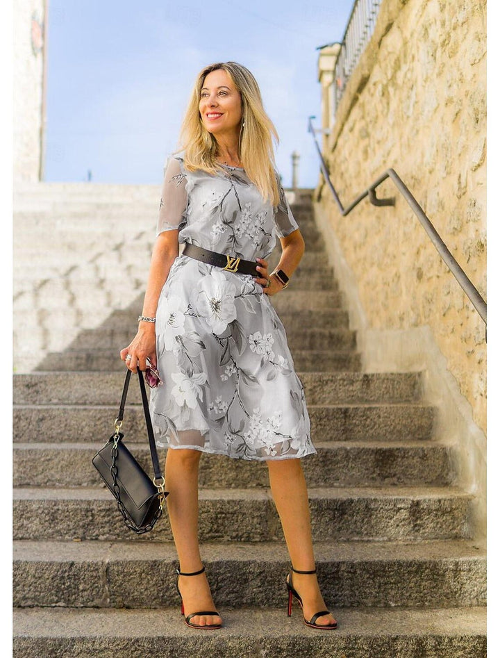 Serenella - geplooide midi-jurk met bloemenprint