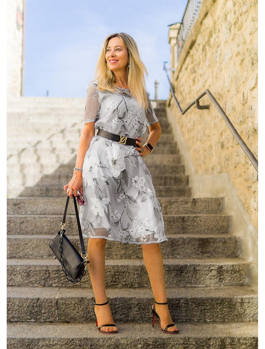 Serenella - geplooide midi-jurk met bloemenprint