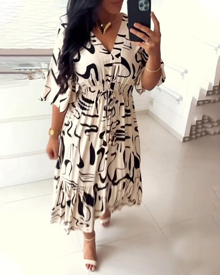 Sanae - Jurk met V-hals en elegante print