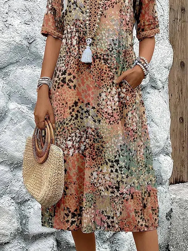 Coraline - Elegante en moderne midi-jurk